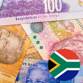 South African rand banknotes beside a round South African flag, from Springbok's blog